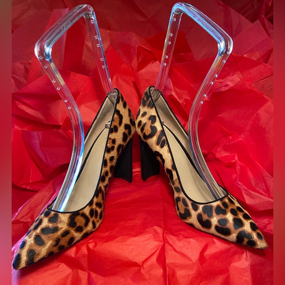 Brand Aldo pump. Cheetah print with black heel.